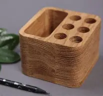 six slot pen holder with extra storage compartment